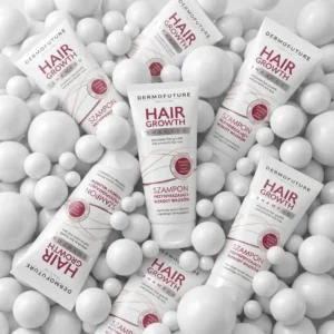 Valkoisia DermoFuture Precision Hair Growth Shampoo -tuubeja eri asennoissa kiiltävien ja helmiäismäisten valkoisten pallojen täyttämällä taustalla.