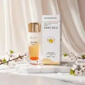 Mercilen Collagen kasvoseerumi ja valkokultainen pakkaus. Lasipullossa on kullankeltaista kosteuttavaa seerumia.