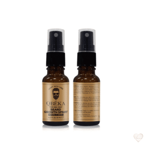 Ruskea lasinen suihkepullo, jonka kultaisessa etiketissä lukee QBÉKA Beard Growth Spray ja on parrakkaan miehen kasvokuva.