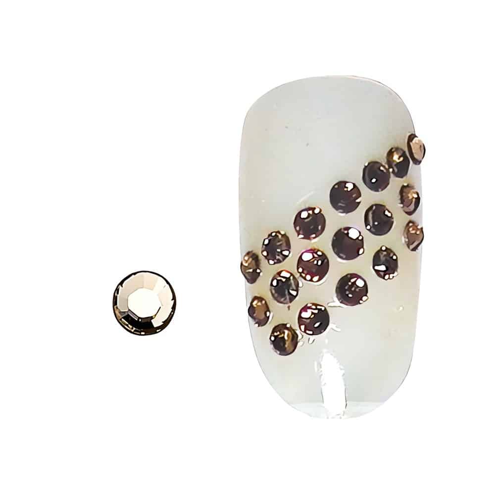 Pirteät sitruunankeltaiset Swarovski-kristallistrassit. Lisää kynsiisi säkenöivää energiaa ja valoa. 20 kpl (1