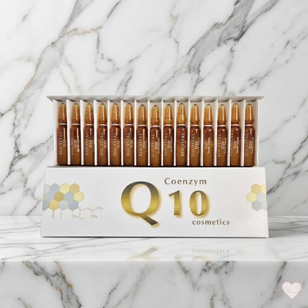 Bio-Vital Q10 -pakkaus avattuna, sisältäen 15 ruskeaa lasiampullia siistissä rivissä marmorialustalla.