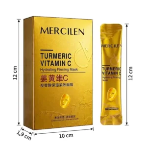 Kultainen Mercilen Turmeric Vitamin C Hydrating Firming Mask -tuotepakkaus ja yksittäinen annospussi, joihin on merkitty tuotteen mitat: korkeus 12 cm, leveys 10 cm ja syvyys 1,9 cm.