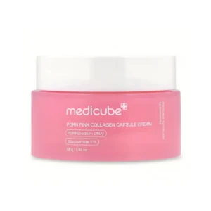 Medicube PDRN Pink Collagen Capsule Cream -kasvovoide matalassa vaaleanpunaisessa purkissa, jossa on tasainen valkoinen kansi puhtaalla valkoisella taustalla.