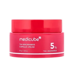 Medicube TXA Niacinamide Capsule Cream -kasvovoide matalassa, tumman vaaleanpunaisessa purkissa kirkkaanpunaisella kannella suoraan edestä kuvattuna puhtaalla valkoisella taustalla.