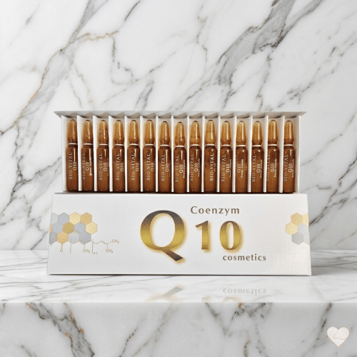 Bio-Vital Q10 -pakkaus avattuna, sisältäen 15 ruskeaa lasiampullia siistissä rivissä marmorialustalla.