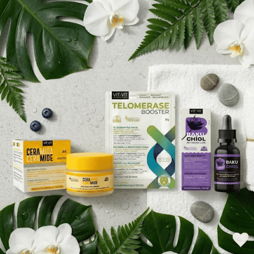 Diet Esthetic Anti-Age tuotepaketti: Ceramide-voide, Telomerase-naamio ja Bakuchiol-seerumi trooppisten lehtien ympäröimänä.