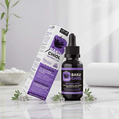 Diet Esthetic Vit Vit Bakuchiol -seerumipullo ja pakkaus marmorialustalla lilan kukan kera.