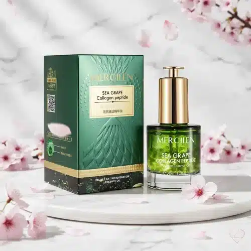 Vihreä Mercilen Merirypäle & Kollageeni -kasvoöljypullo helmillä ja tuotteen tummanvihreä kohokuvioitu pakkaus.