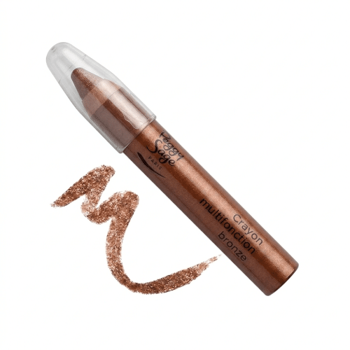 Peggy Sage Crayon multifonction bronze -meikkikynä, jonka vieressä on metallinhohtoinen pronssinruskea väriveto valkoisella taustalla.