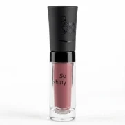Peggy Sage So Shiny Cinnamon huulikiilto kirkkaassa hylsyssä, jossa näkyy pehmeän kanelinen, lämmin vanhan roosan sävy ja mattapintainen musta korkki.