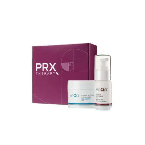 Violetti PRX Therapy -lahjapakkaus, jonka edessä WiQo-kasvovoide purkissa ja silottava kasvoneste pumppupullossa.